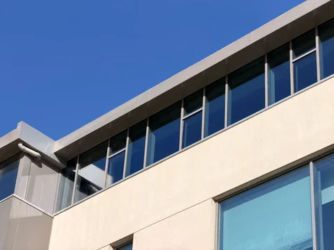 School exterior walls and upper windows after cleaning