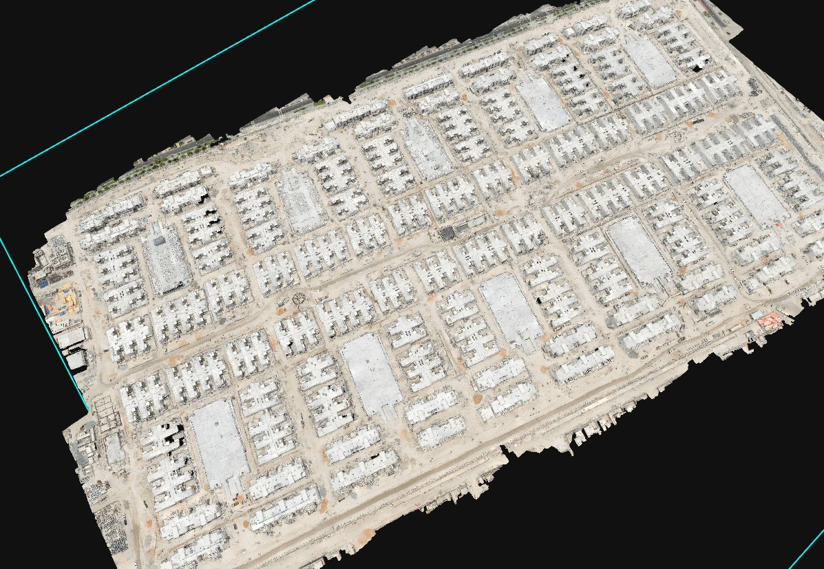 A pale textured 3D reconstruction shows a residential development at an earlier construction stage