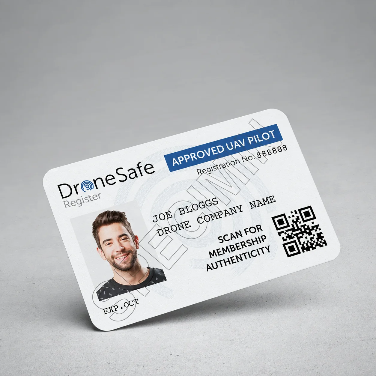 A sample drone operator identification card appears on a plain background