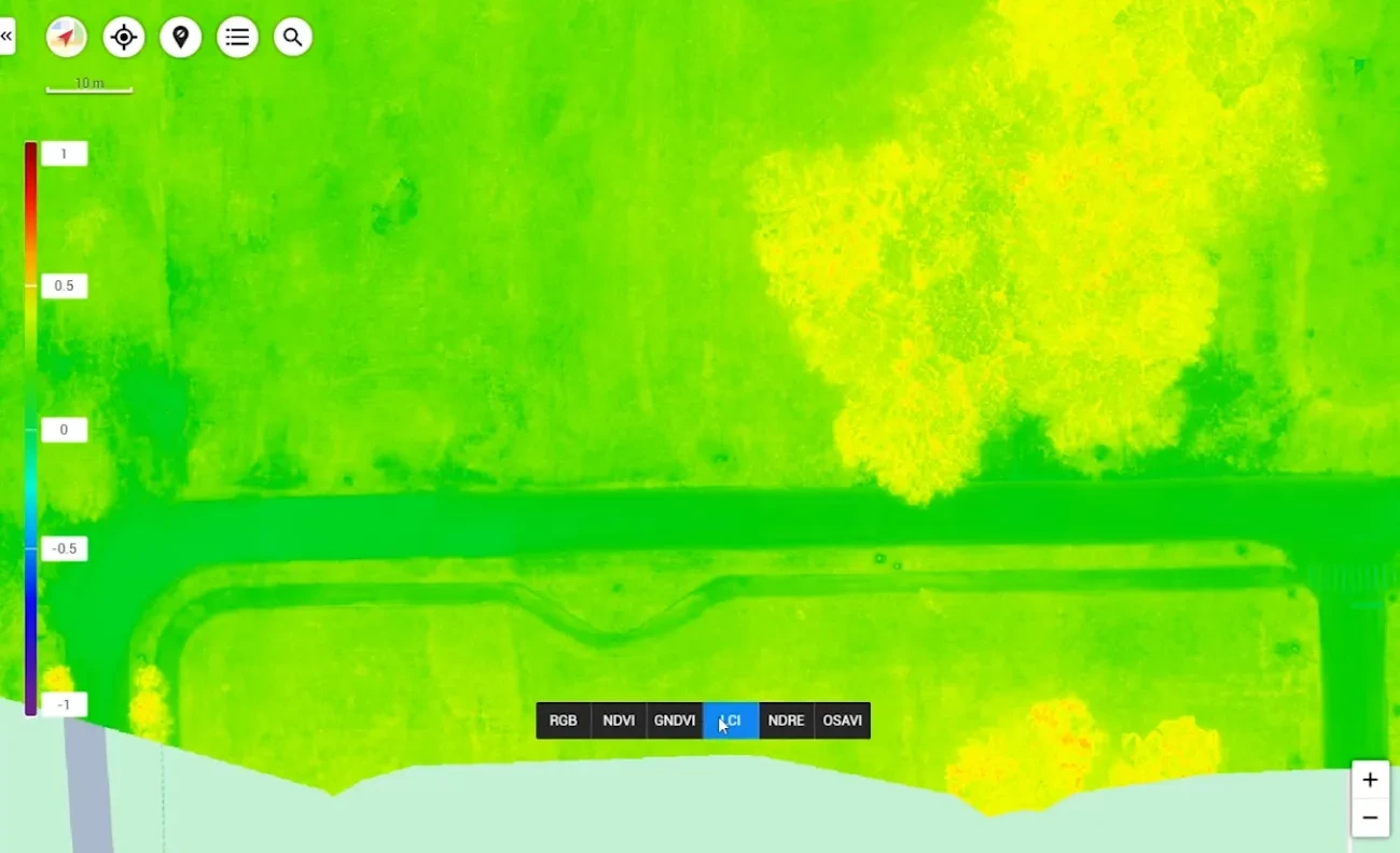 A green and yellow LCI map shows spatial variation in a planted area beside paved paths