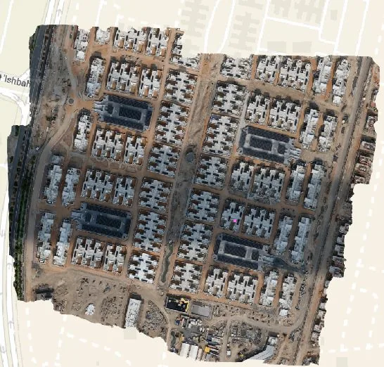 A stitched overhead survey map shows the full layout of a residential construction project